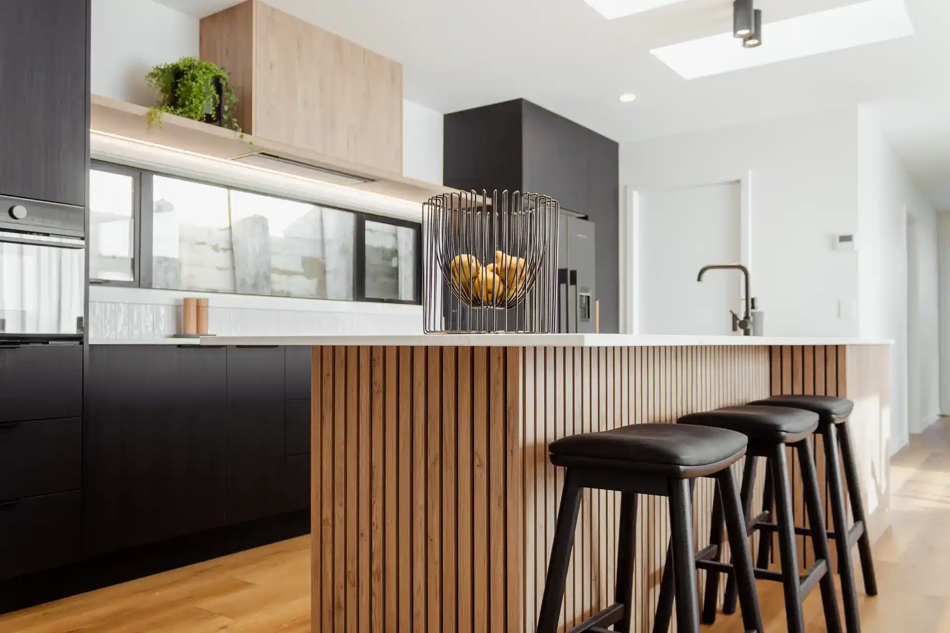 Modern kitchen design Paraparaumu showroom featuring custom cabinetry and coastal styling