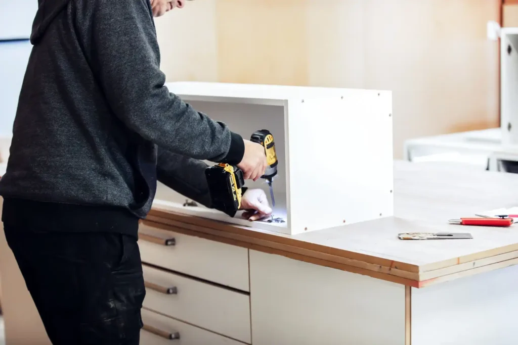 Paekakariki kitchen renovation showcasing bespoke cabinetry with marine-grade coastal finishes and natural timber detailing